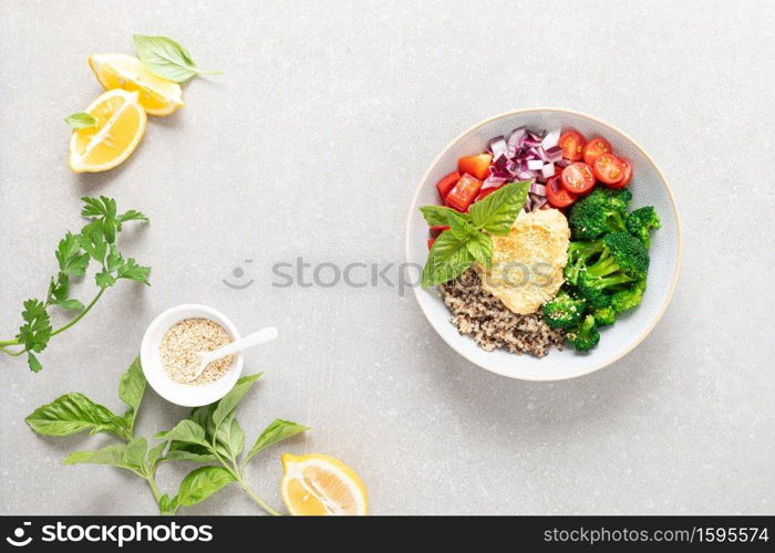 Vegetarian Buddha bowl with quinoa, vegetables and hummus, healthy food concept