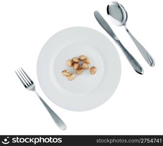 Vegetarian dish -buckwheat. A crude product of the big size on an empty plate
