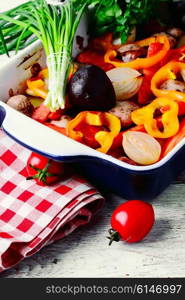 vegetarian dish of roasted tomatoes,peppers,potatoes and mushrooms