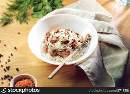 Vegetarian food. Rice with soy meat served in white bowl.