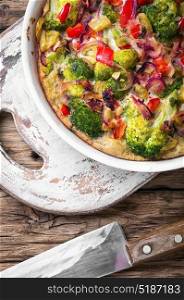 Vegetarian Italian Omelette. Italian cuisine.Vegetarian Italian omelet in a baking dish
