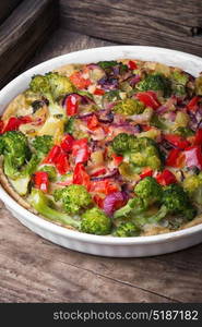 Vegetarian Italian Omelette. Vegetarian Italian omelet with vegetables in a baking dish