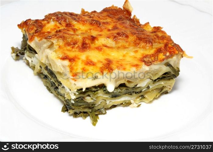 Vegetarian lasagna with ricotta cheese and spinach filling