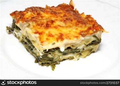 Vegetarian lasagna with ricotta cheese and spinach filling