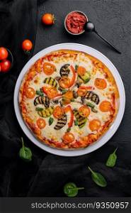 vegetarian pizza with zucchini, eggplant, mushrooms and tomato