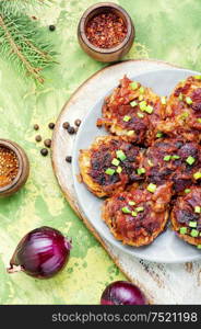 Vegetarian red onion cutlets on a plate.Vegetable cutlets. Dietary vegetable cutlets.