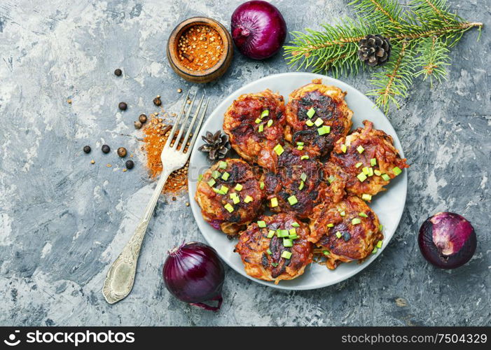 Vegetarian red onion cutlets on a plate.Vegetable cutlets.Homemade cutlets. Dietary vegetable cutlets.