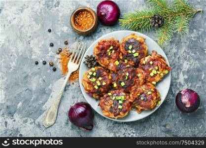 Vegetarian red onion cutlets on a plate.Vegetable cutlets.Homemade cutlets. Dietary vegetable cutlets.