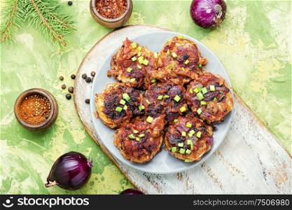 Vegetarian red onion cutlets on a plate.Vegetable cutlets.Homemade cutlets. Dietary vegetable cutlets.