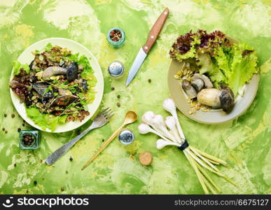 Vegetarian salad with mushrooms. Autumn salad with wild mushrooms and lettuce