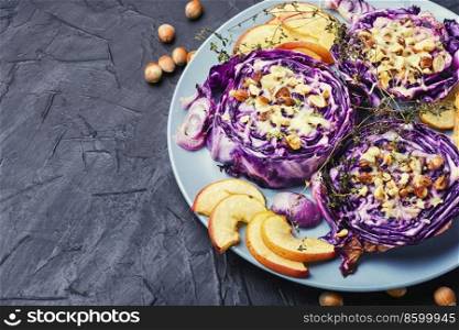 Vegetarian steak of red cabbage, apples and nuts. Healthy appetizer.. Baked vegan red cabbage steaks