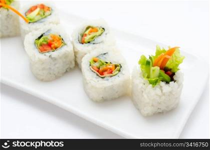 vegetarian sushi rolls with avocado and vegetables