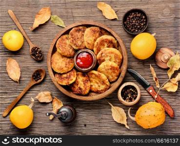 Vegetarian vegetable cutlets from autumn pumpkin. Autumn food.Diet concept.Vegetarian food.. Diet vegetable pumpkin cutlet