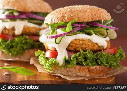 veggie carrot and oats burger with cucumber onion tomato