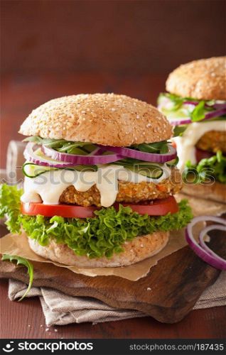 veggie carrot and oats burger with cucumber onion tomato