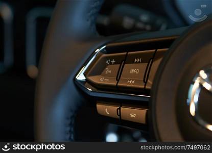 Vehicle interior of a modern car with voice control button