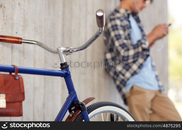vehicle, people and lifestyle - man with fixed gear bicycle on street