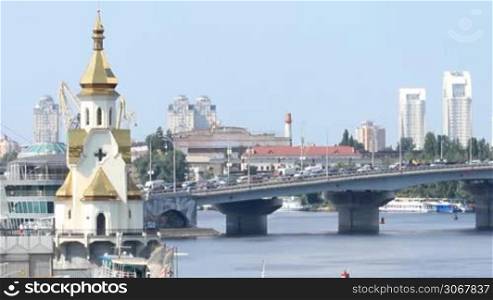 vehicular traffic on the bridge across the Dnieper River in Kiev