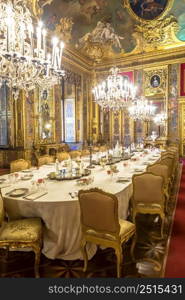 VENARIA REALE, ITALY - CIRCA AUGUST 2020: luxury dining room in Baroque style with gala dinner table setting