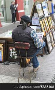 Vendor selling paintings on street, Santiago, Santiago Metropolitan Region, Chile