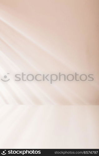 Venetian blind light on the wall. Venetian blind light on the white wall and table in the morning