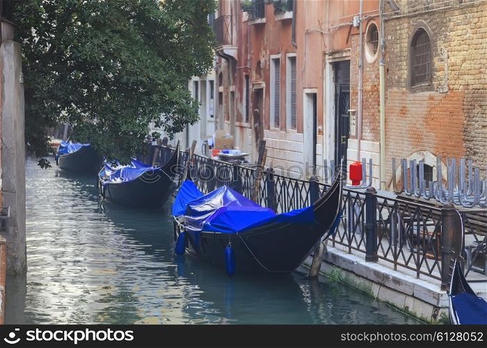 Venetian gondolas in narrow channel, Venice, Italy&#xA;