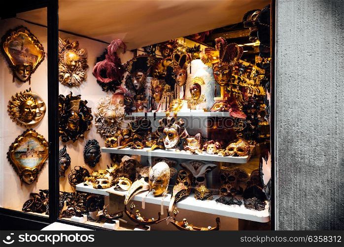 Venetian shop window with masks and sovereigns