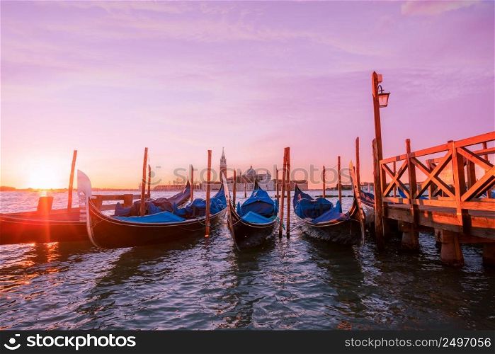 Venice boats at sunrise