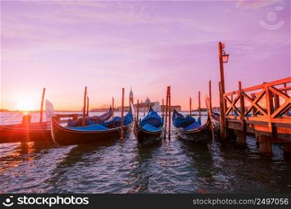 Venice boats at sunrise