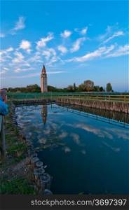"Venice Burano Mazorbo vineyard with "campanile" belltower of Saint Caterina on background"