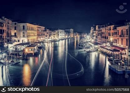 Venice city at night, beautiful majestic cityscape, many glowing lights in the buildings over grand canal at nighttime, tourism and travel to Italy