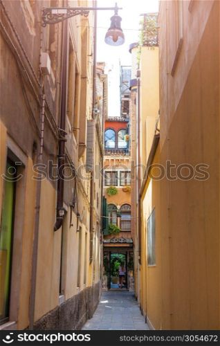 Venice Italian Destination. Narrow Venetian Pathway. Quaint street in historic Venice.. Venetian buildings in Italy