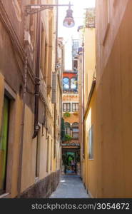 Venice Italian Destination. Narrow Venetian Pathway. Quaint street in historic Venice.. Venetian buildings in Italy