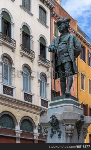VENICE, ITALY - 26 JUNE, 2014: The monument of Carlo Goldoni. Carlo Goldoni is a great Italian playwright and librettist. The monument of Carlo Goldoni. Carlo Goldoni is a great Italian playwright and librettist. The monument of Carlo Goldoni. Carlo Goldoni is a great Italian