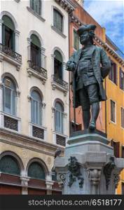 VENICE, ITALY - 26 JUNE, 2014: The monument of Carlo Goldoni. Carlo Goldoni is a great Italian playwright and librettist. The monument of Carlo Goldoni. Carlo Goldoni is a great Italian playwright and librettist. The monument of Carlo Goldoni. Carlo Goldoni is a great Italian