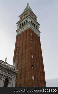 Venice, Italy - April 1, 2013: Street views of ancient architecture in Venice, Italy. Venice is a city in northeastern Italy sited on a group of 118 small islands separated by canals and linked by bridges.