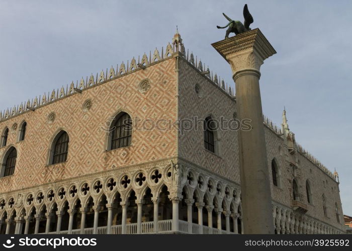 Venice, Italy - April 1, 2013: Street views of ancient architecture in Venice, Italy. Venice is a city in northeastern Italy sited on a group of 118 small islands separated by canals and linked by bridges.