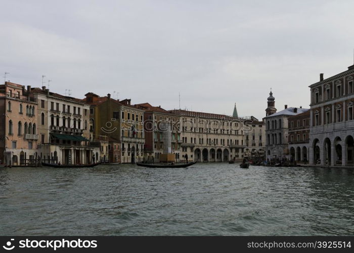 Venice, Italy - April 1, 2013: Street views of canals and ancient architecture in Venice, Italy. Venice is a city in northeastern Italy sited on a group of 118 small islands separated by canals and linked by bridges.