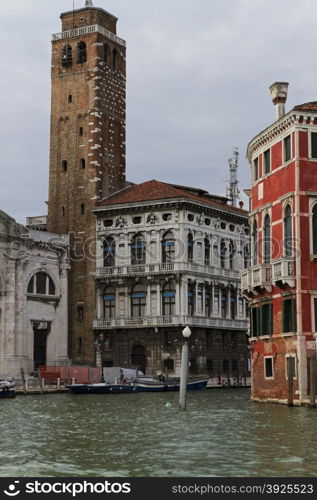 Venice, Italy - April 1, 2013: Street views of canals and ancient architecture in Venice, Italy. Venice is a city in northeastern Italy sited on a group of 118 small islands separated by canals and linked by bridges.