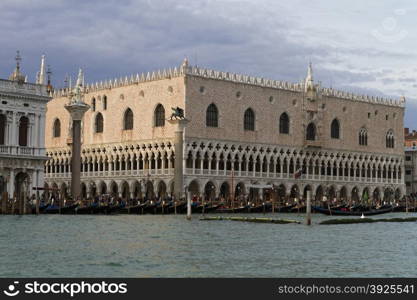 Venice, Italy - April 1, 2013: Street views of canals and ancient architecture in Venice, Italy. Venice is a city in northeastern Italy sited on a group of 118 small islands separated by canals and linked by bridges.