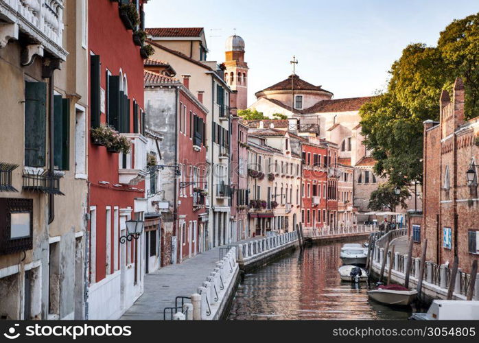 Venice, Italy. Grand Canal and historic tenements. Beautiful view of Grand Canal and multicoloured old medival buildings.. Venice canal scene in Italy