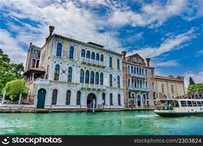 Venice, Italy - June 01, 2014 - Historic buildings along the canal in Venice