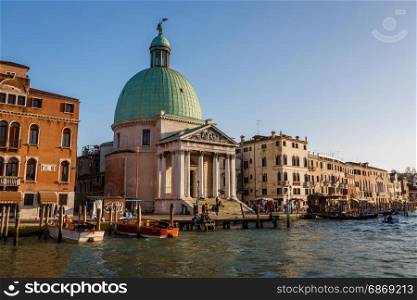 VENICE, ITALY - MARCH 7: A View of the Chiesa de San Simeone Piccolo and the Grand Canal on March 7, 2014 in Venice, Italy. Facing the railroad terminal, it is a monument widely seen in the city.