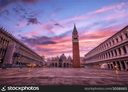 Venice, Italy - October 10, 2019: Saint Mark&rsquo;s square with campanile and basilica in Venice, Italy at dawn.