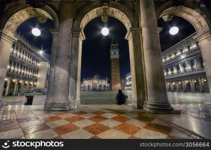 Venice, Italy - October 9, 2019: Saint Mark&rsquo;s square with campanile and basilica in Venice, Italy at night.
