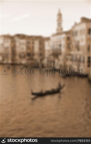 VENICE, ITALY. The famous Grand Canal from Rialto bridge at sunset. In Sepia toned. Retro style. In blur style