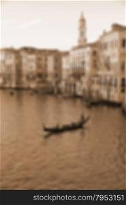 VENICE, ITALY. The famous Grand Canal from Rialto bridge at sunset. In Sepia toned. Retro style. In blur style