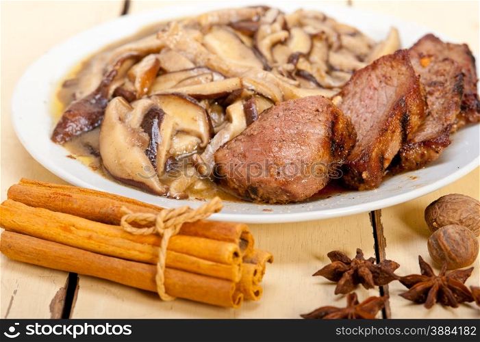 venison deer game filet tenderloin and fresh wild mushrooms