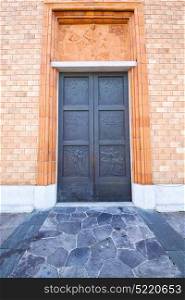 vergiate italy church varese the old door entrance and mosaic sunny daY rose window