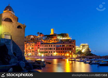 Vernazza. The old harbor at night.. The medieval fishing village with traditional Italian colorful houses Vernazza. Cinque Terre National Park. Liguria. Italy.